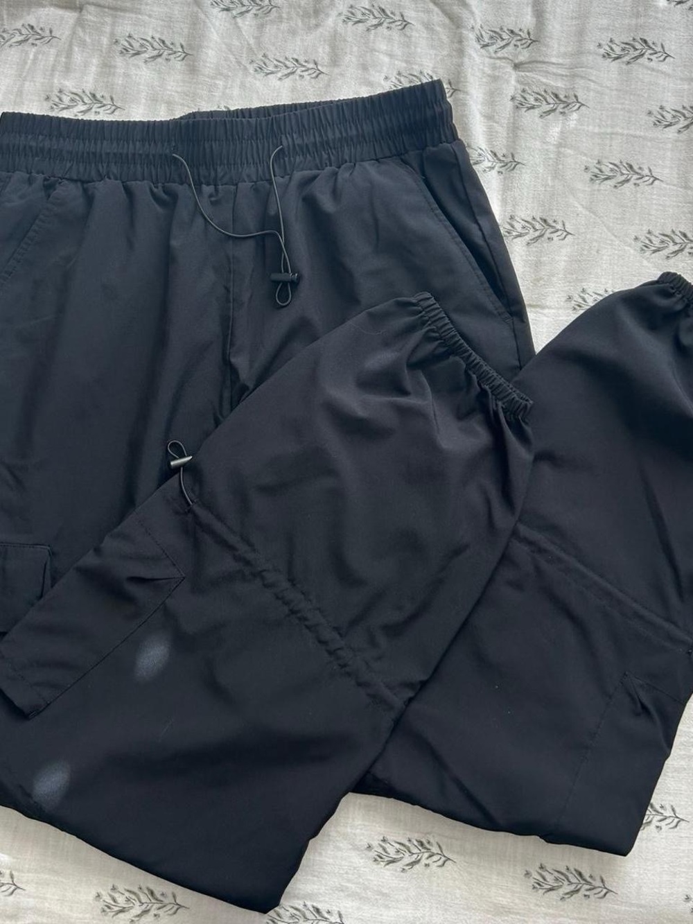 Women’s Black cargo athletic pants with adjustable waist and cuffs